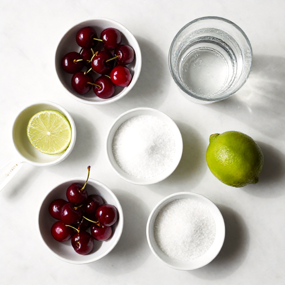 Maraschino cherries, limes, sugar, and sparkling water arranged on a white marble surface