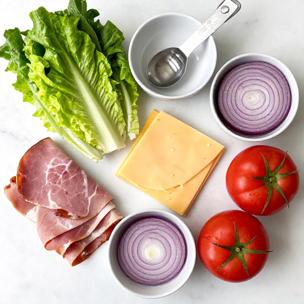 Raw ingredients for 1905 salad with ham and swiss