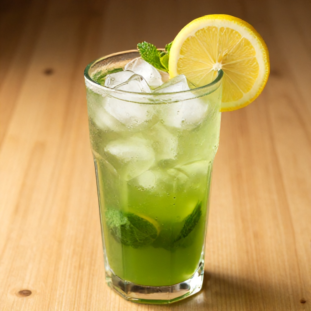 Glass of mint lemon verbena iced tea with lemon slice